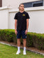Black tshirt with yellow van embroidered design