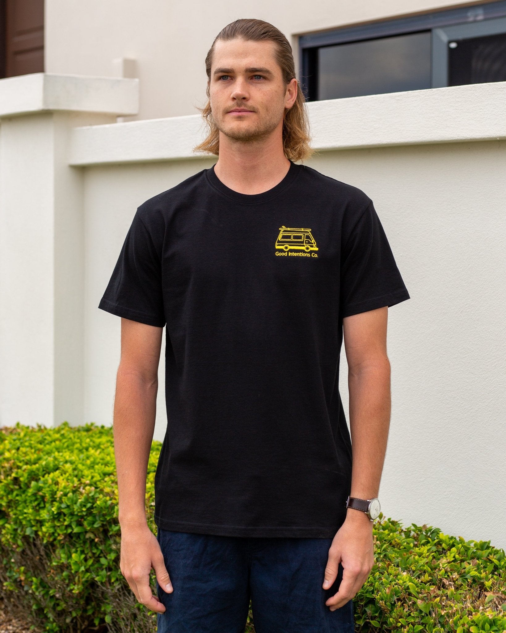 Black tshirt with yellow embroidered design 