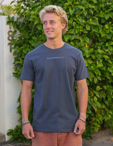Man wearing blue coloured tshirt with blue embroidered design 